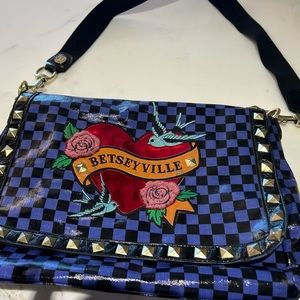 Unique Betseyville tote bag never used. It was a gift.